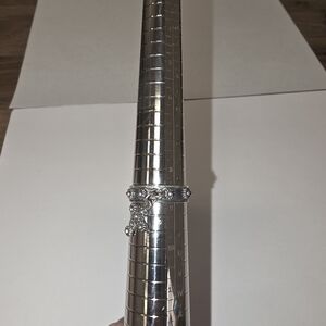 Intricate Silver Ring with Floral Accents